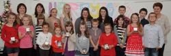 Sunday School children pictured after receiving their 10th anniversary medals.  Included is the Sunday School leader Hilary Shaw (left in back row) and Sunday School teachers Margaret Strong (second from left) and Lynda McDonald (right).